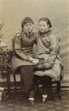 (CHINA) Group of 38 attractive studio portraits of beautifully-attired Chinese men, women and children,